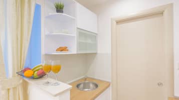 Appartamento, 2 letti singoli | Cucina privata