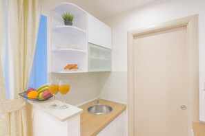 Appartement, 2 lits une place | Cuisine privée