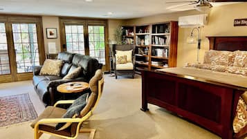 Smart TV, fireplace, table football, books