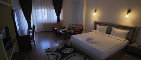 Deluxe Double Room | 1 bedroom, premium bedding, minibar, individually decorated