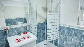 Shower, free toiletries, hair dryer, towels