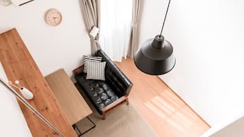 Design Studio, 1 Bedroom, City View | Living room | Flat-screen TV