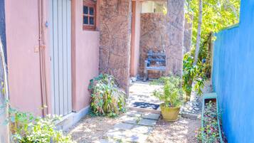 Deluxe Double Room, 1 Queen Bed, Bathtub, Garden View | Terrace/patio