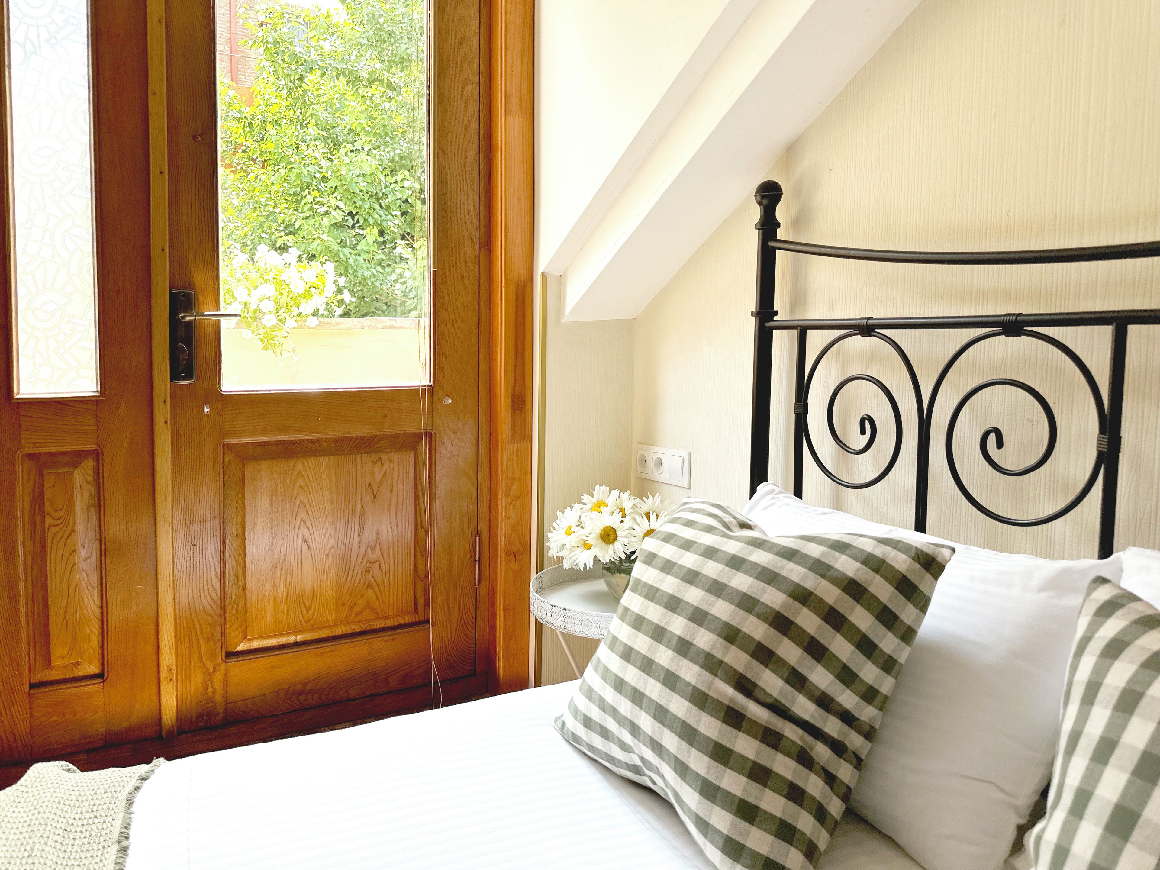 economy double room | premium bedding, minibar, in-room safe, blackout curtains