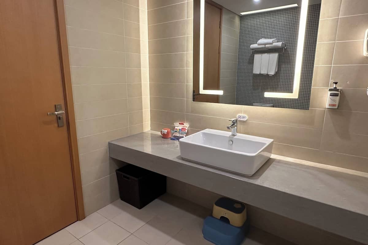 suite, multiple beds | bathroom | shower, hair dryer, slippers, towels