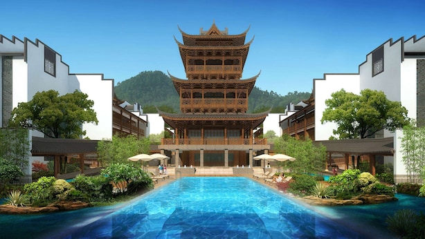 A traditional Chinese building with a multi-tiered roof, a swimming pool in the foreground, and lush greenery surrounding the area. - Wyndham Guilin Pingle (Guilin)