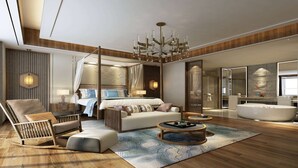 A spacious living area with a large sofa, a rocking chair, a coffee table, and a large window. - Wyndham Guilin Pingle (Guilin)