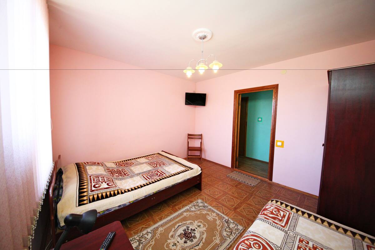 Laptop workspace, free WiFi, bed sheets