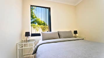 1 bedroom, desk, iron/ironing board, travel cot