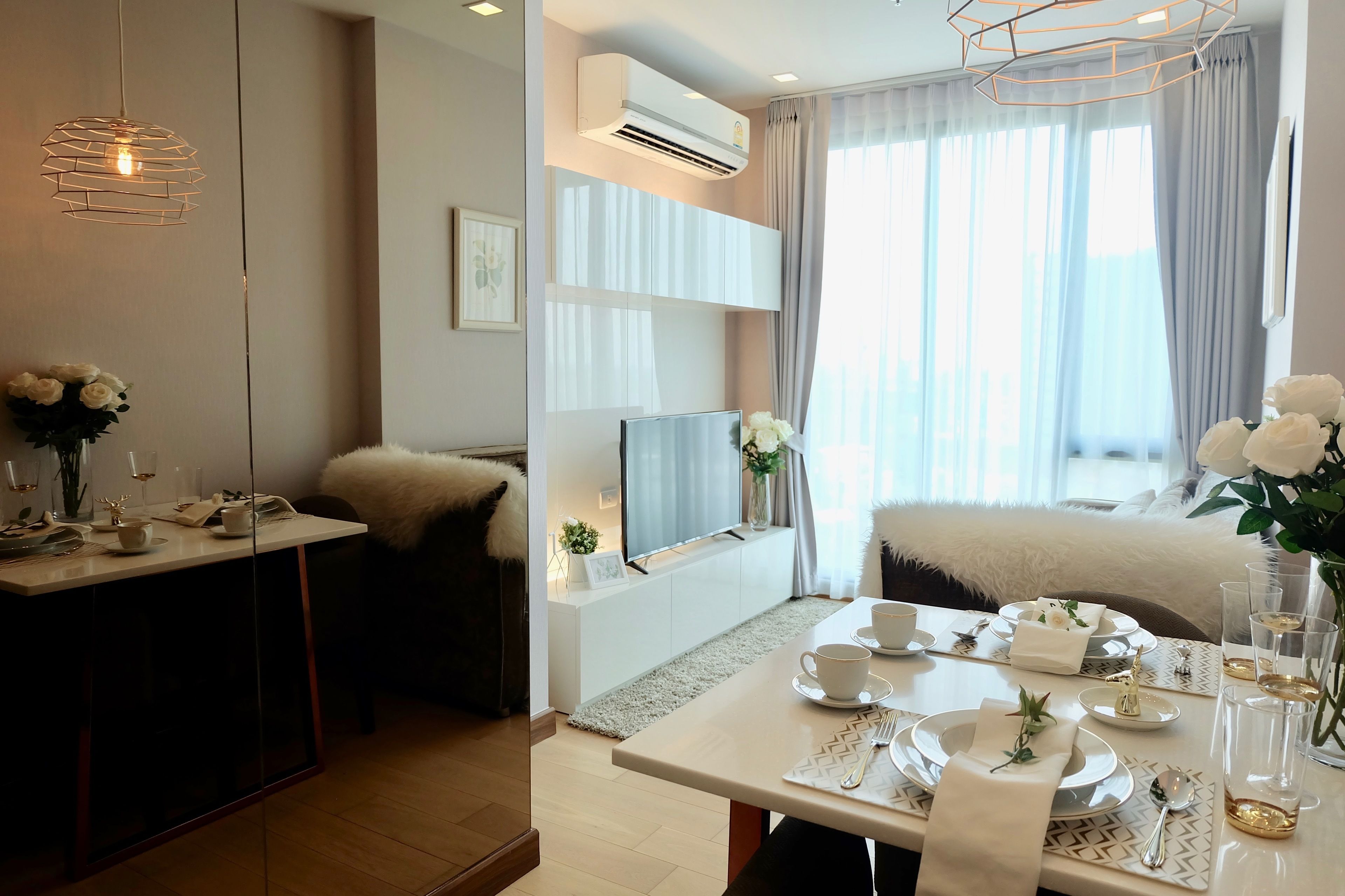 Standard Apartment with City View (A1120) | Living area | 40-inch flat-screen TV with cable channels, TV