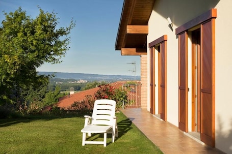 Terrace/patio. Panoramic apartment in villa with garden