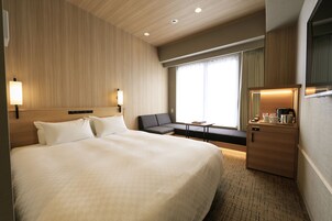 Premium bedding, desk, iron/ironing board (on request), WiFi (free)
