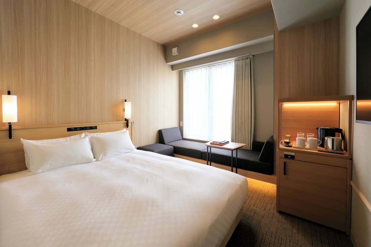 Premium bedding, desk, iron/ironing board (on request), free WiFi