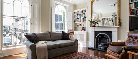 TV, fireplace, books