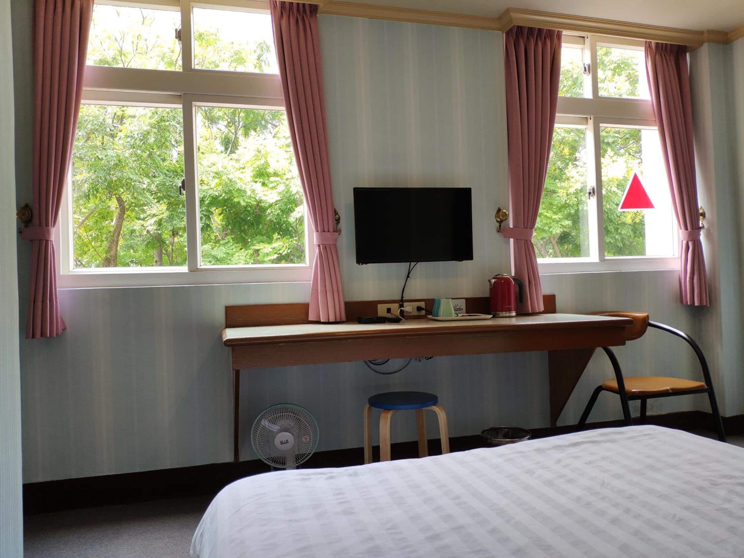 desk, laptop workspace, blackout curtains, free wifi