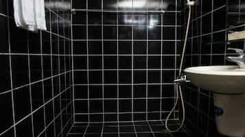 Economy Double Room | Bathroom | Shower, free toiletries, hair dryer, slippers