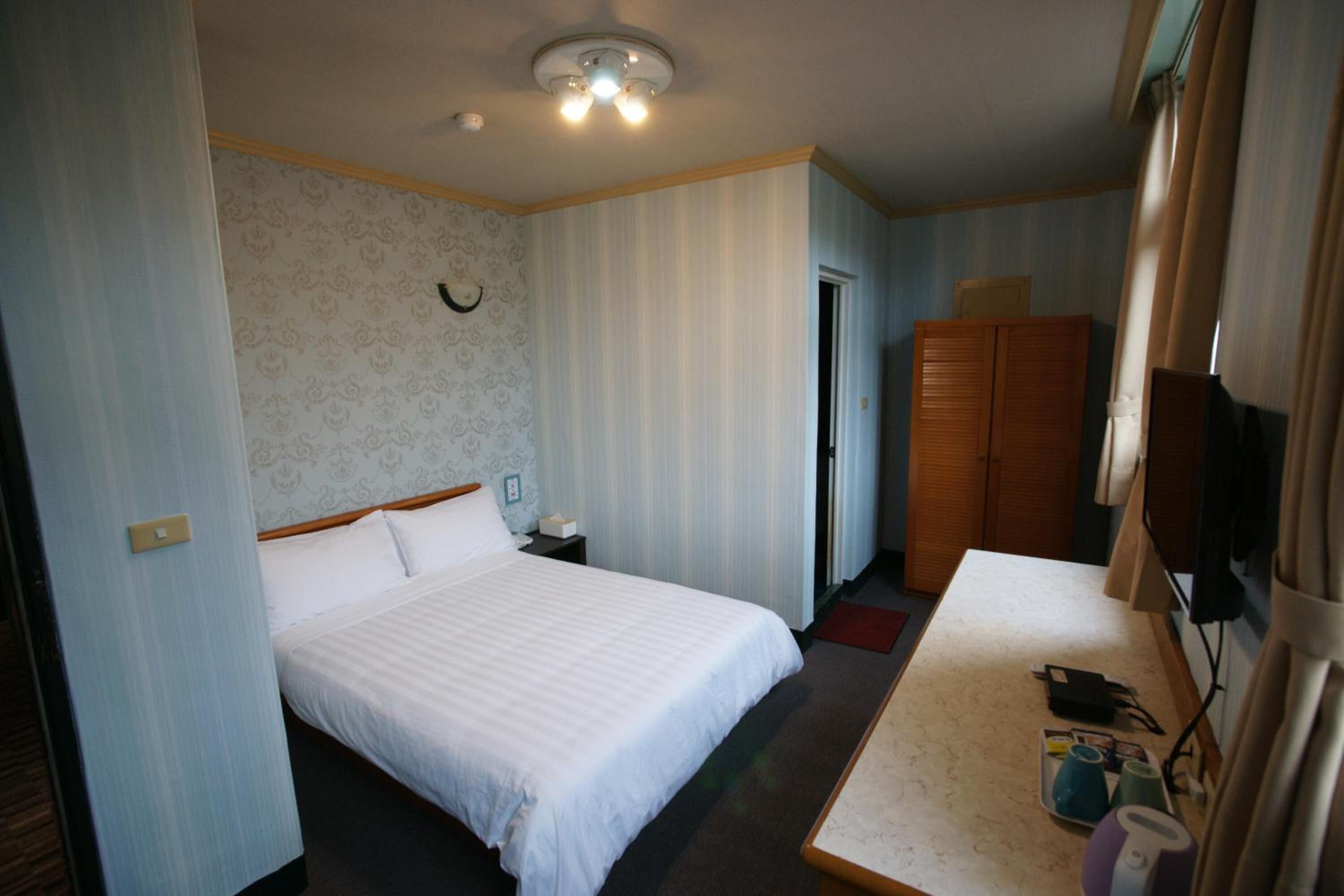 desk, laptop workspace, blackout curtains, free wifi