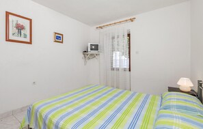 1 quarto, berço de viagem, Wi-Fi de cortesia, roupa de cama