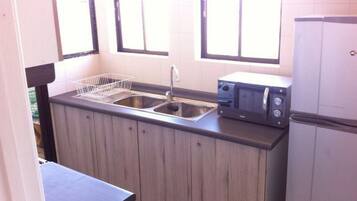 Apartment, 4 Bedrooms | Private kitchen | Fridge