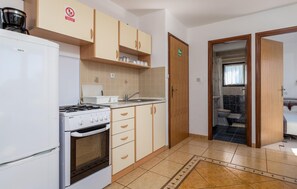 Fridge, stovetop, coffee/tea maker, cookware/dishes/utensils