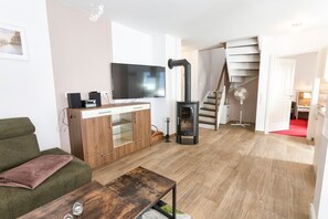 Fernseher, Kamin