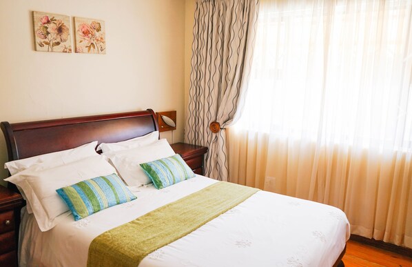 ห้องแฟมิลี่สวีท | เครื่องนอนระดับพรีเมียม, มินิบาร์, โต๊ะทำงาน, เตารีด/โต๊ะรีดผ้า