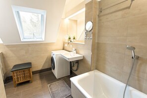 Shower, hair dryer, towels