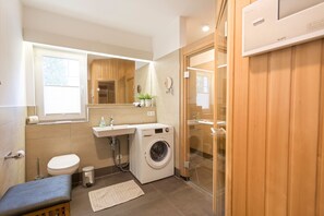 Shower, hair dryer, towels