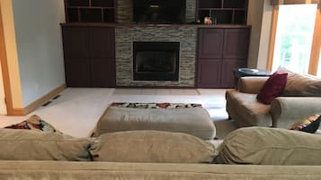 Smart TV, fireplace, DVD player, foosball