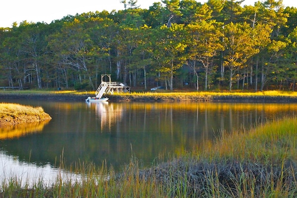 Chauncey Creek, and the property's private dock and waterfront location.