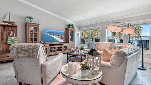 Updated - Dolphins - MOM Clean - Waterfront- Lux 4 Bedroom / 3 Bath (Unit #203)