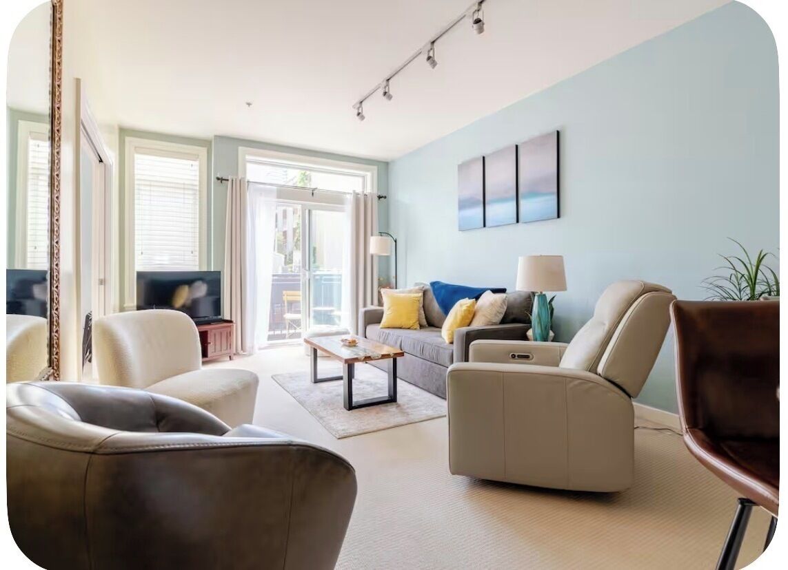 Light and bright living room with comfy sofa bed