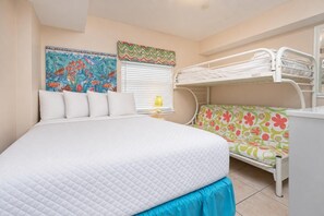 A room with a bed, bunk beds, a colorful wall mural, and a window with blinds. - 2 BR @ Seaside Beach & Racquet (Orange Beach)