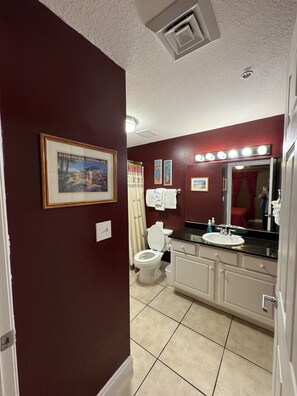 Combined shower/bathtub, hair dryer, towels, soap