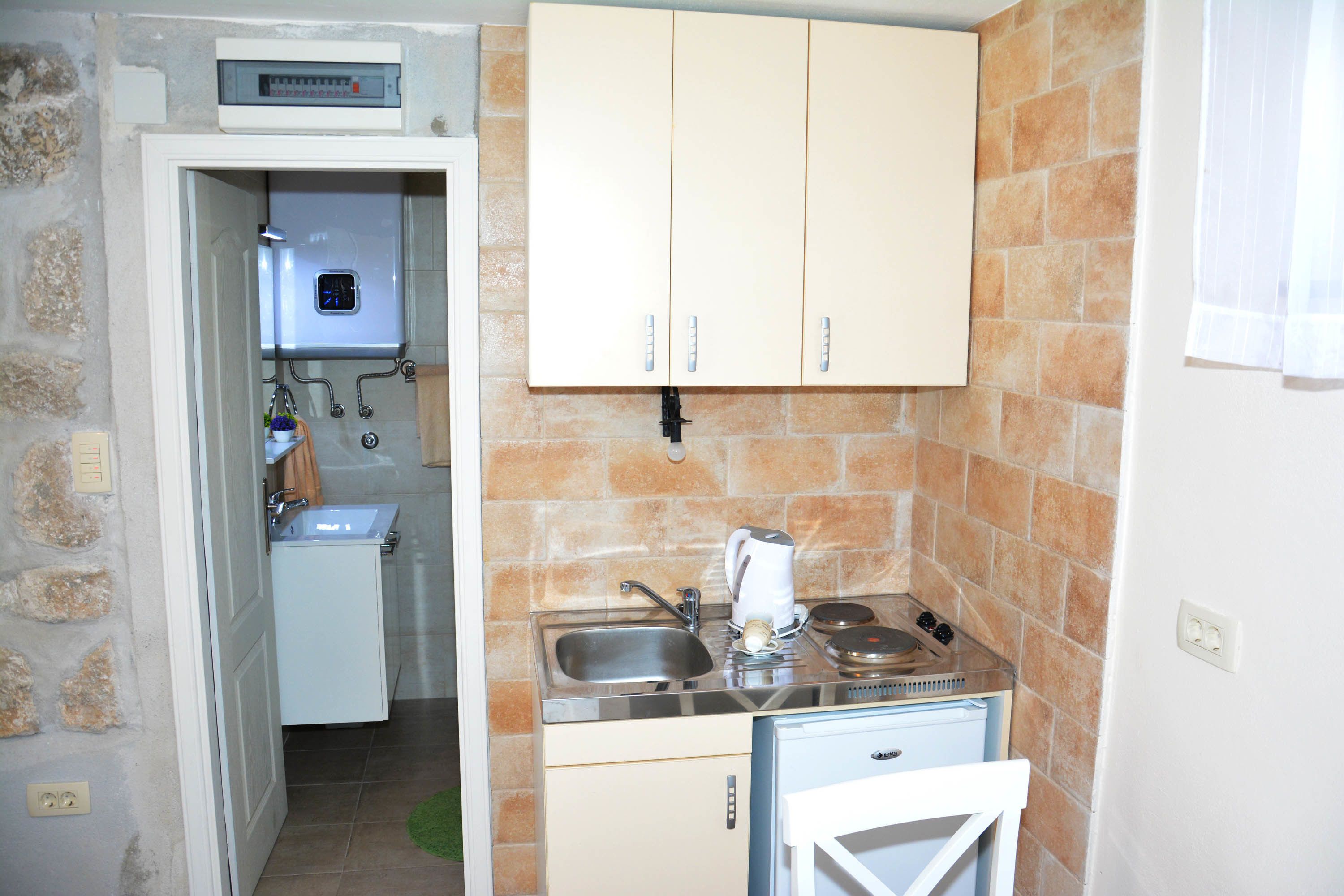 apartment, terrace, sea view | private kitchenette | fridge, stovetop, electric kettle, cookware/dishes/utensils