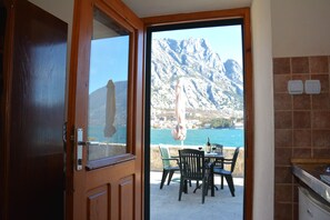 Appartement, 1 chambre, vue mer | Bureau, fer et planche à repasser, Wi-Fi gratuit, draps fournis