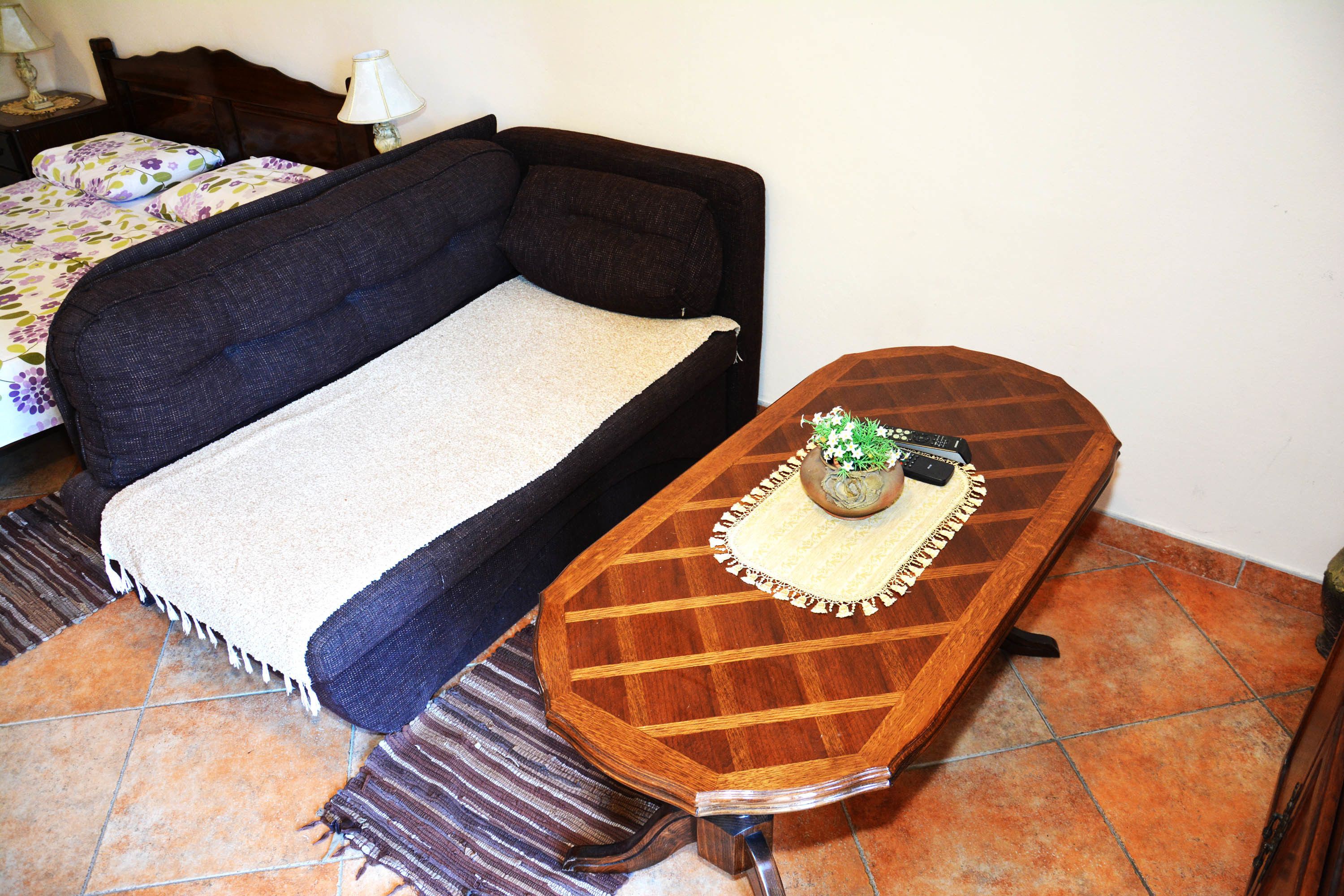 apartment, 1 bedroom, sea view | living area | flat-screen tv