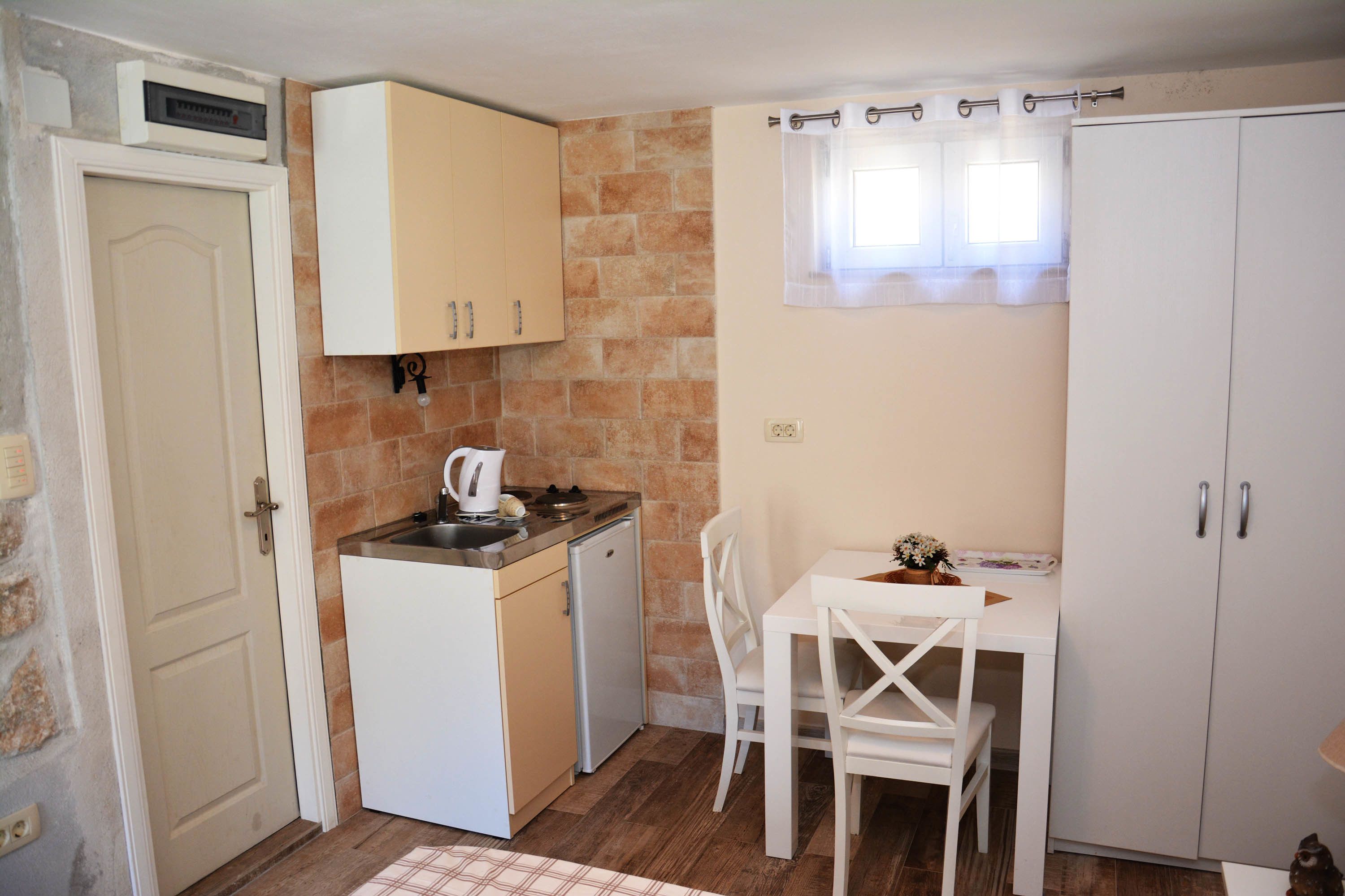 apartment, terrace, sea view | in-room dining