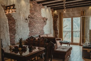 Signature Apartment, 1 Bedroom, Sea View | 1 bedroom, desk, soundproofing, iron/ironing board