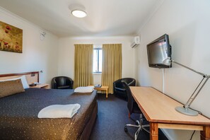 Deluxe Room, 1 Queen Bed | Desk, iron/ironing board, free WiFi, bed sheets