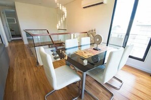Dining - Modern Coastal Escape | Walk to Beach, Cafes & CBD (North Ward)