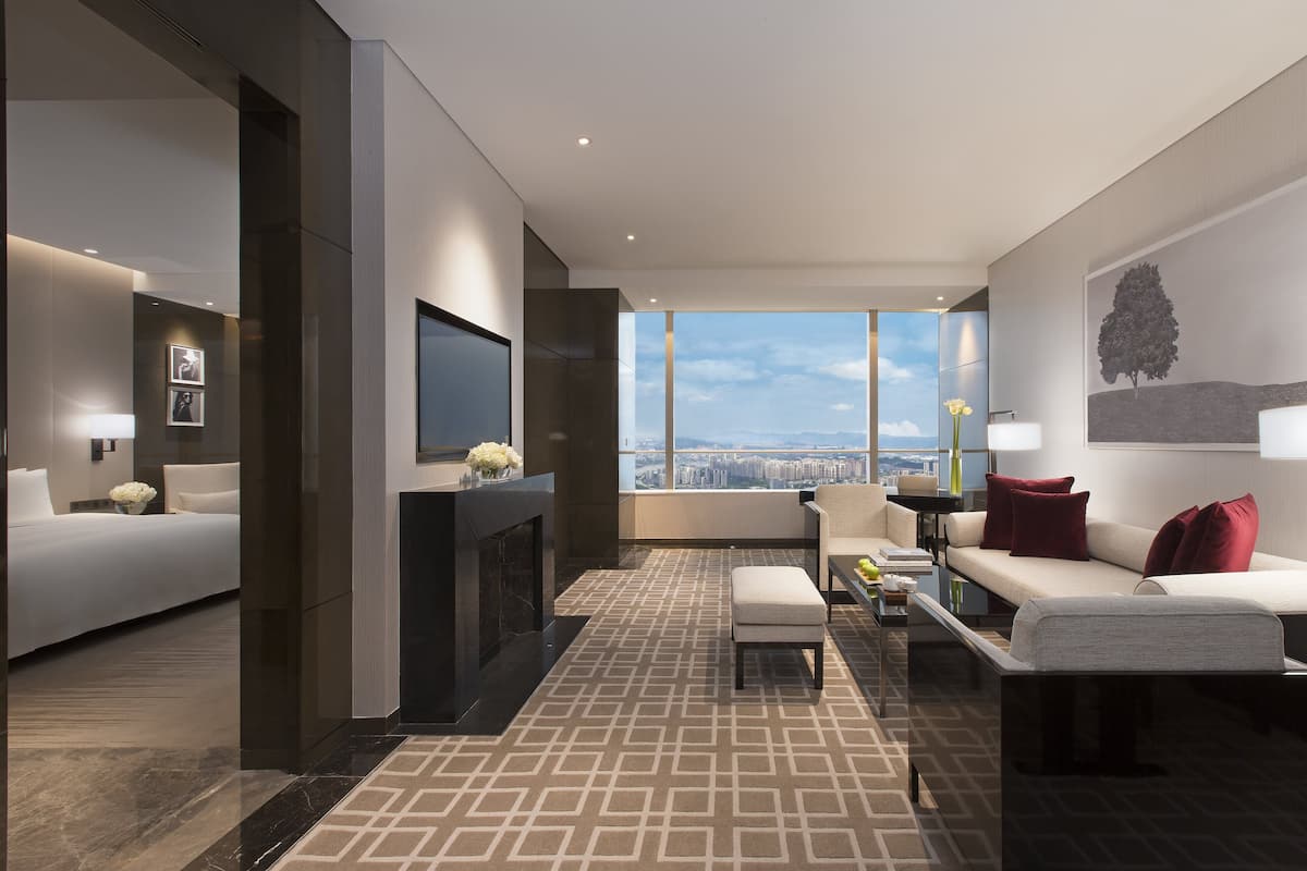 Explorer Suite | Minibar, in-room safe, desk, laptop workspace