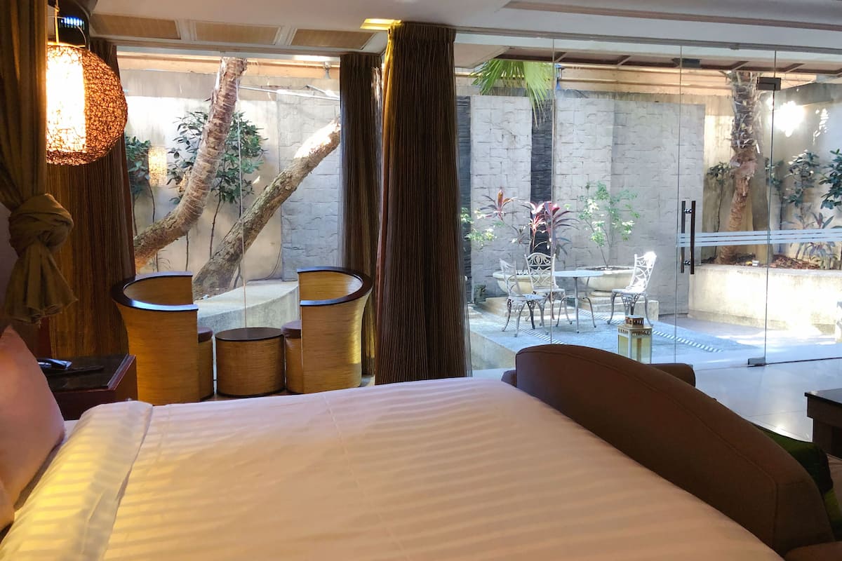 deluxe double room, balcony | garden view