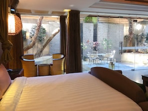 Deluxe Double Room, Balcony | Garden view
