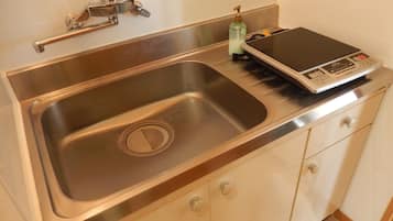 Quadruple Room, Non Smoking | Private kitchenette | Fridge, stovetop