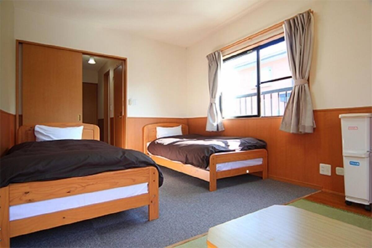 Down comforters, desk, blackout drapes, WiFi (free)