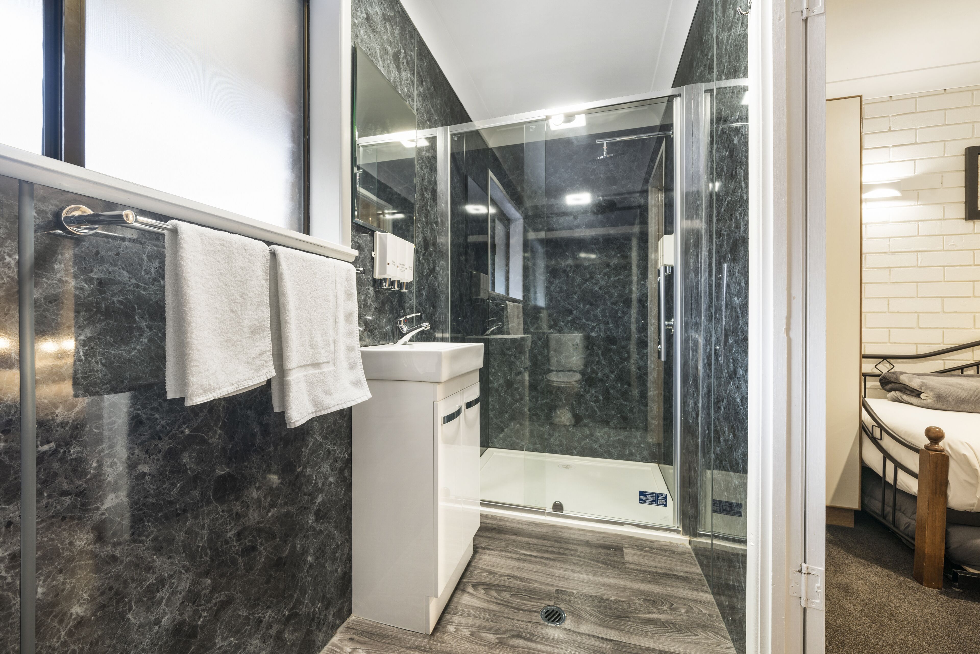 Twin Room | Bathroom | Shower, free toiletries, hair dryer, towels