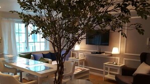 The Kings Park Suite | Living area | 28-inch flat-screen TV with cable channels, TV - The Kings Park Residence (Seoul)