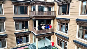 A multi-story building with a central balcony and multiple windows. - Hotel Grand Nubra (Leh)