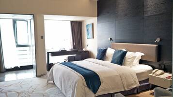 Deluxe Double Room  | Minibar, in-room safe, desk, blackout drapes